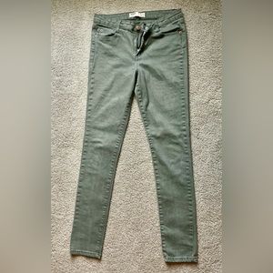 Army green soft skinny jeans.